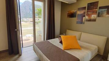 Double Room with Balcony at First Floor | Minibar, in-room safe, laptop workspace, soundproofing