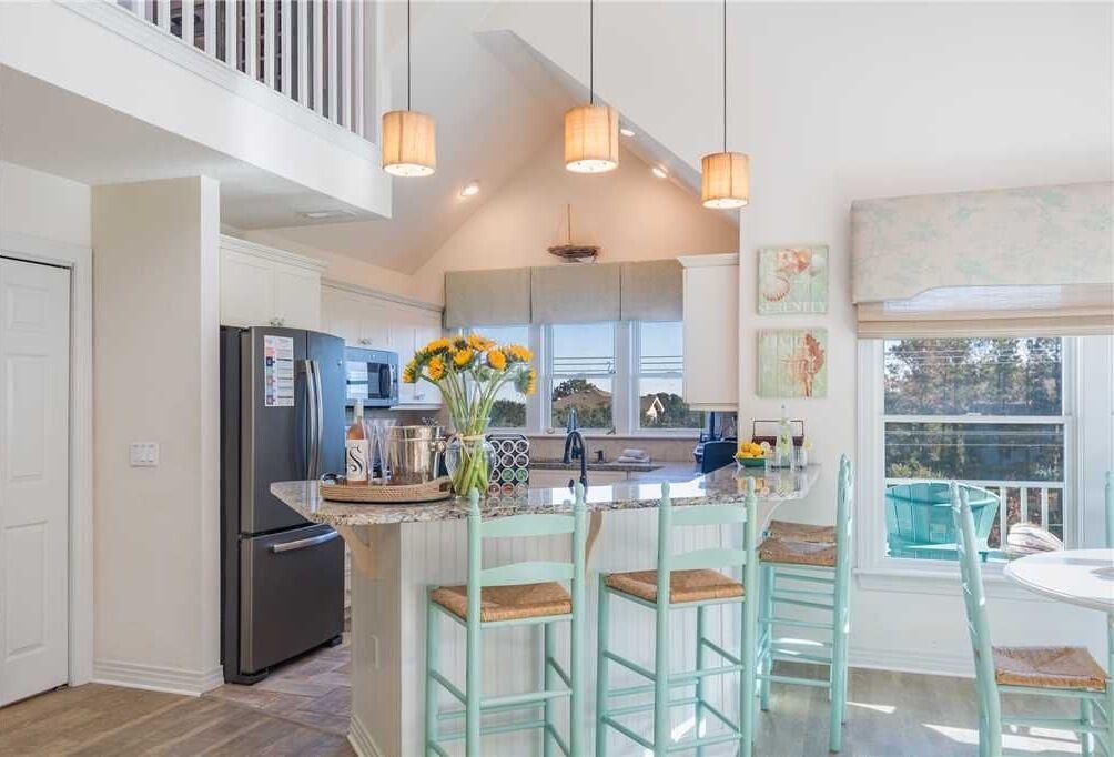 Fridge, stovetop, dishwasher, coffee/tea maker