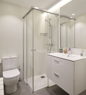 Bathtub, hair dryer, towels
