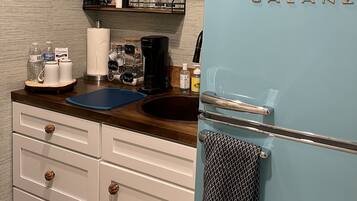 Fridge, microwave, coffee/tea maker, toaster