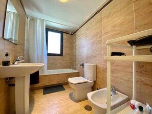 Bathtub, hair dryer