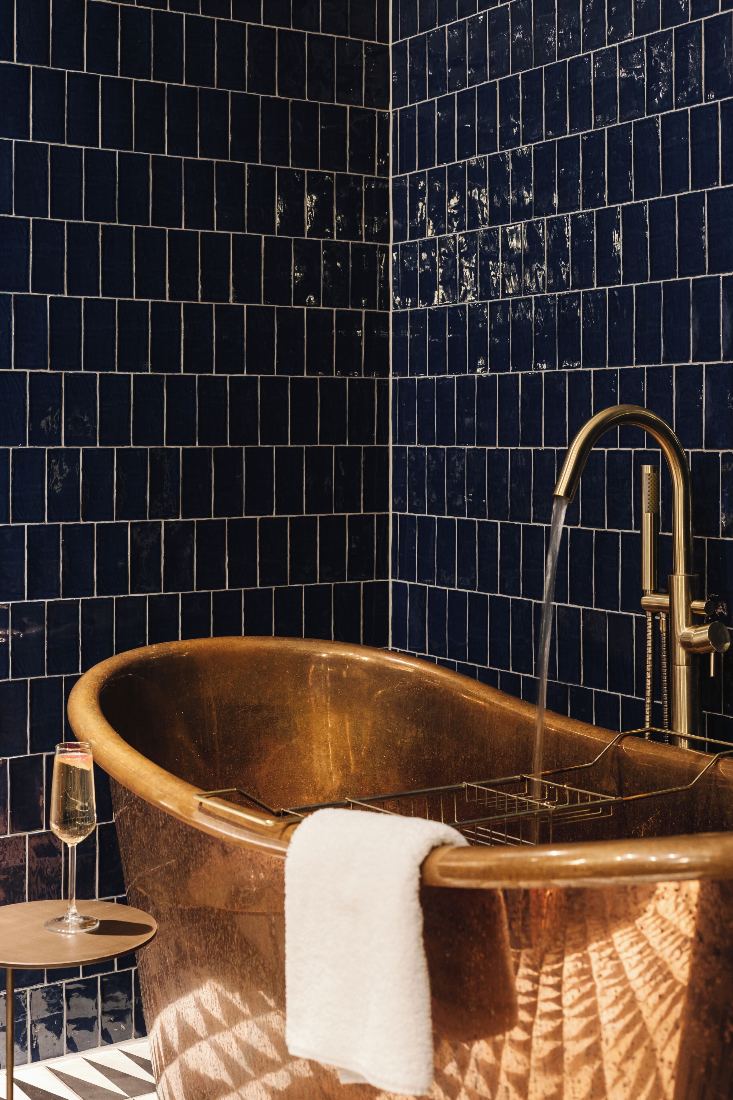 junior studio suite | bathroom | designer toiletries, hair dryer, towels, soap