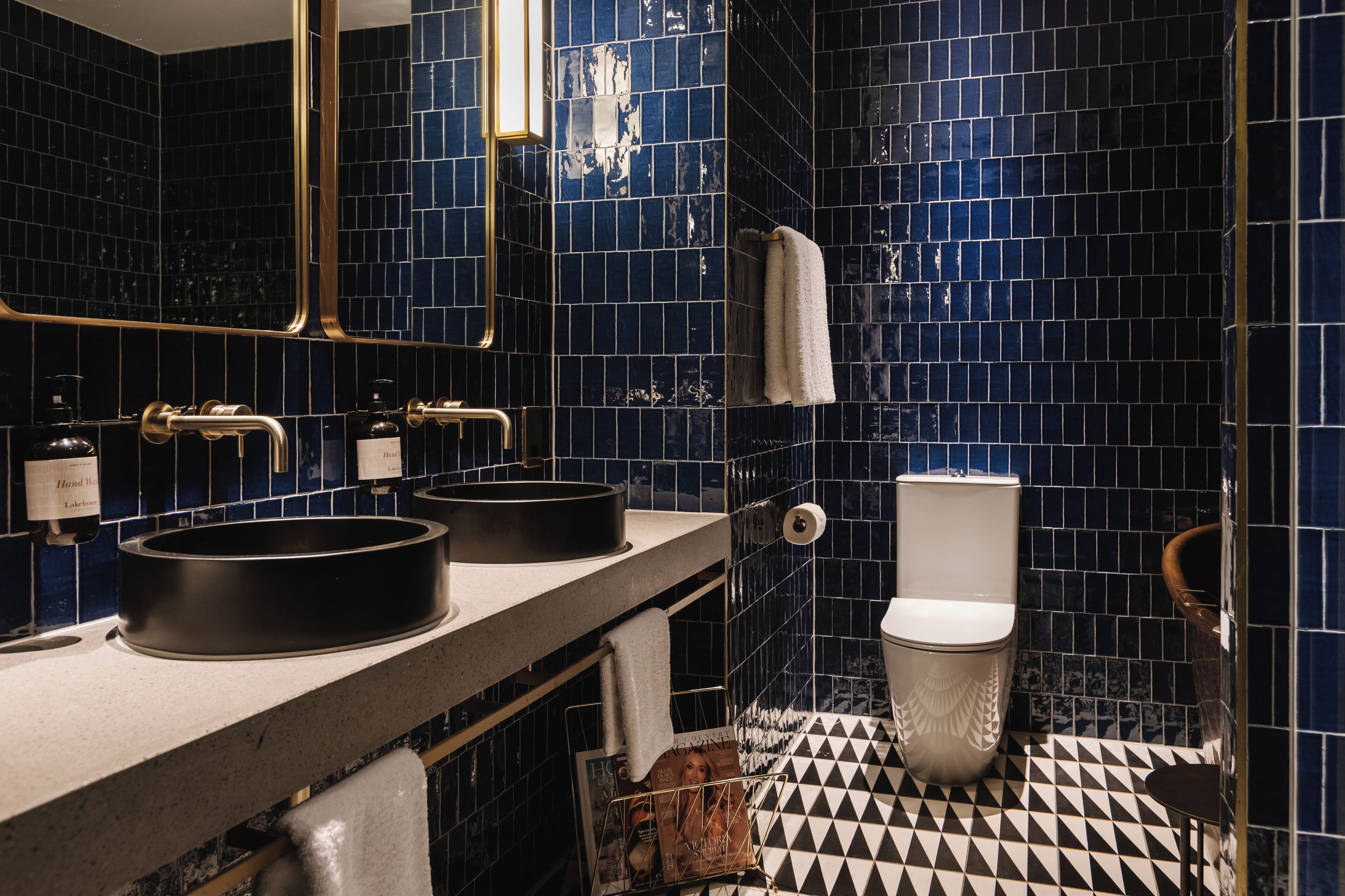 junior studio suite | bathroom | designer toiletries, hair dryer, towels, soap