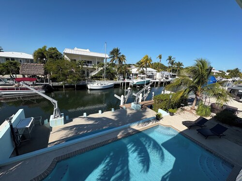 Yellowtail Island Retreat - 3BR Keys Home w/ Pool, Dockage, Porch & Canal Access