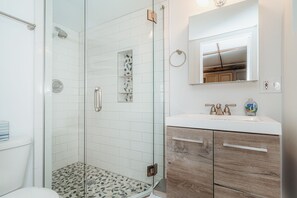 Bathtub, hair dryer, towels, soap