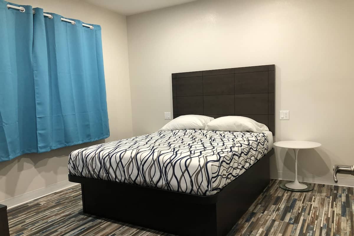 Desk, laptop workspace, WiFi (free), bed sheets