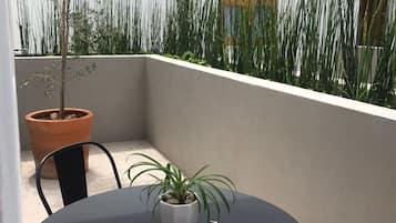 Quarto luxo, terraço | Terraço/pátio