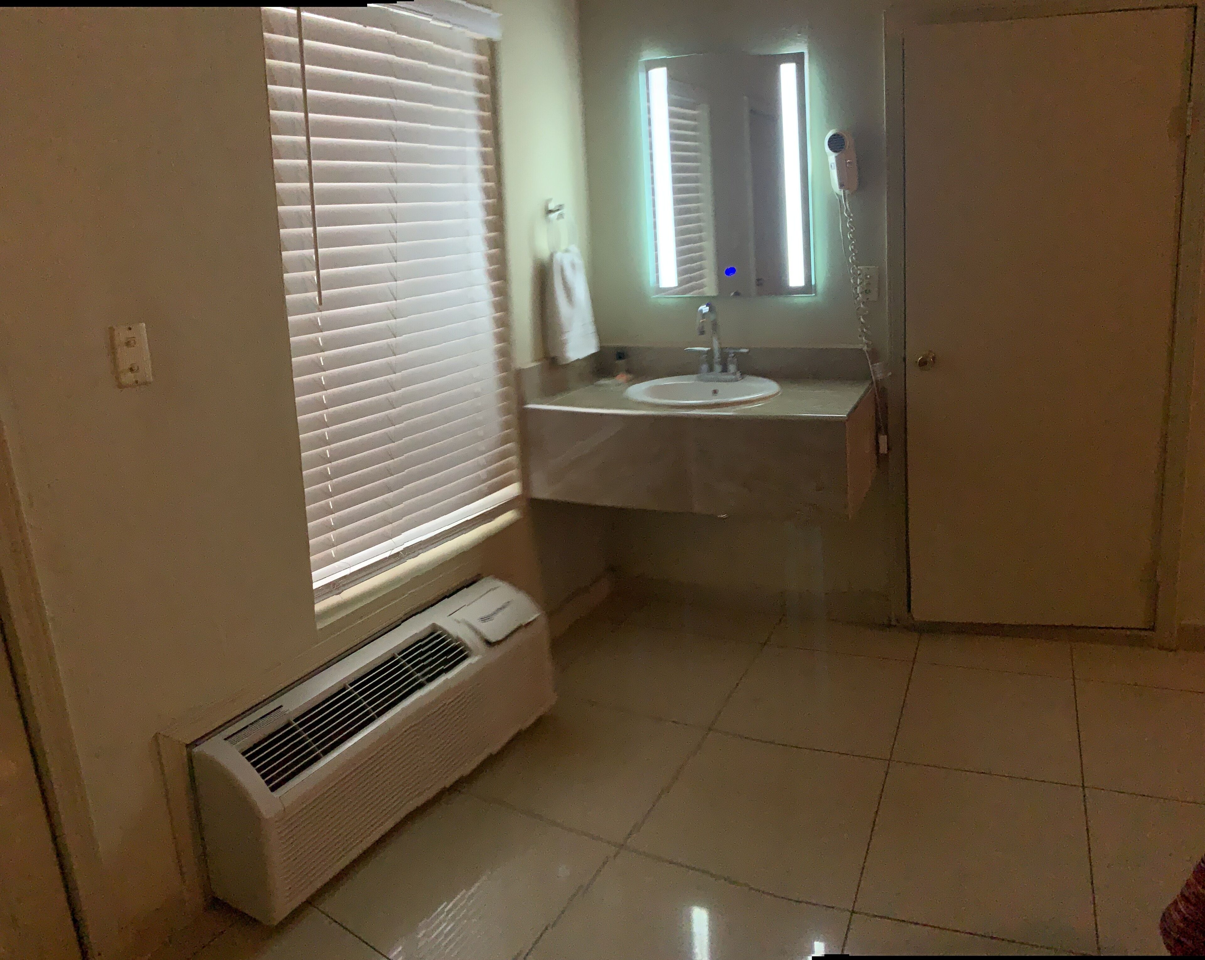 basic double room, 2 double beds | bathroom | shower, hair dryer, towels, soap