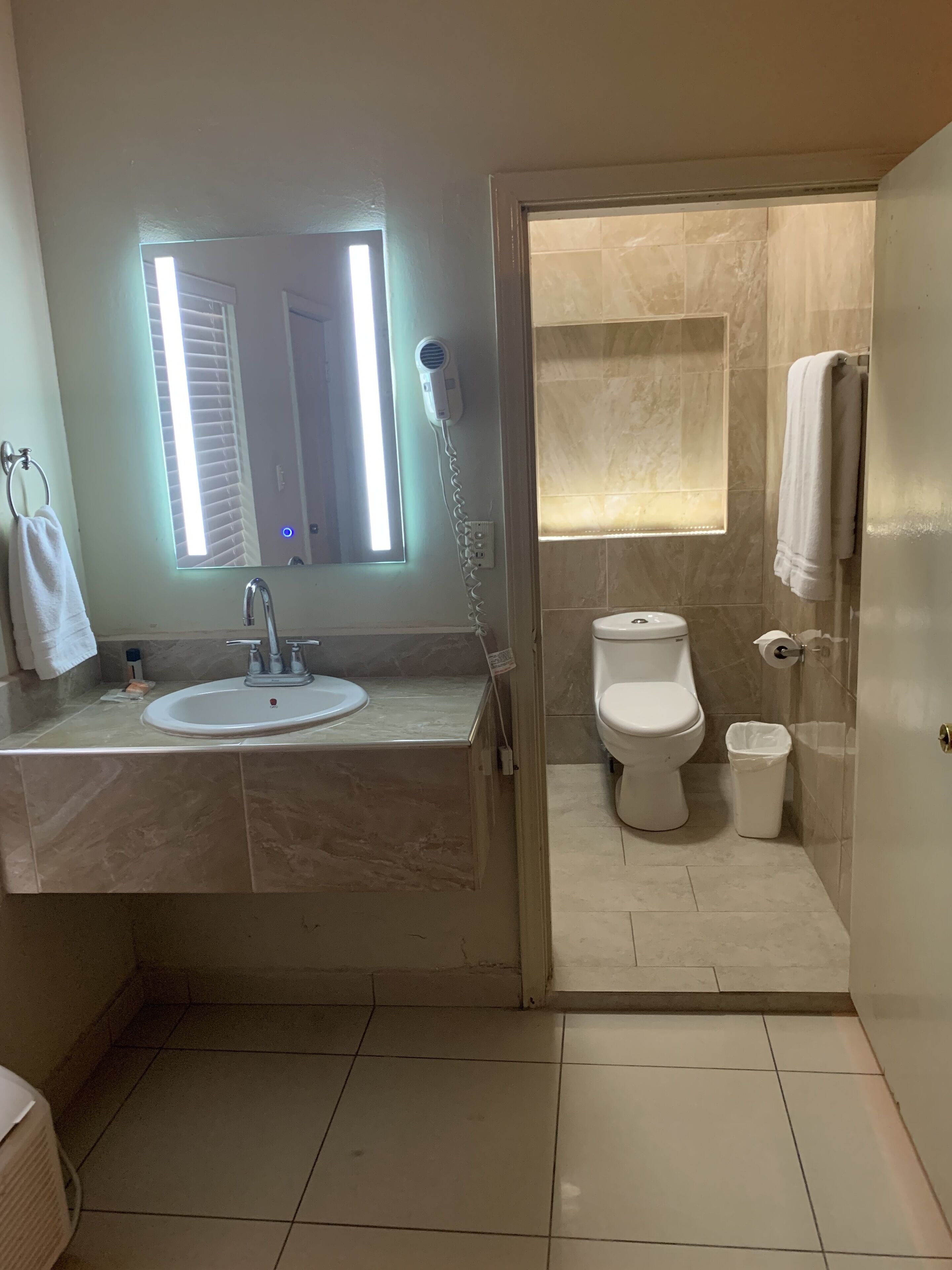 basic double room, 2 double beds | bathroom | shower, hair dryer, towels, soap