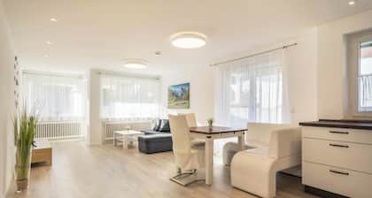 Light-flooded and Modern Apartment “Gartenstraße” with Terraces and Garden