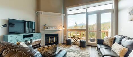 TV, fireplace, books