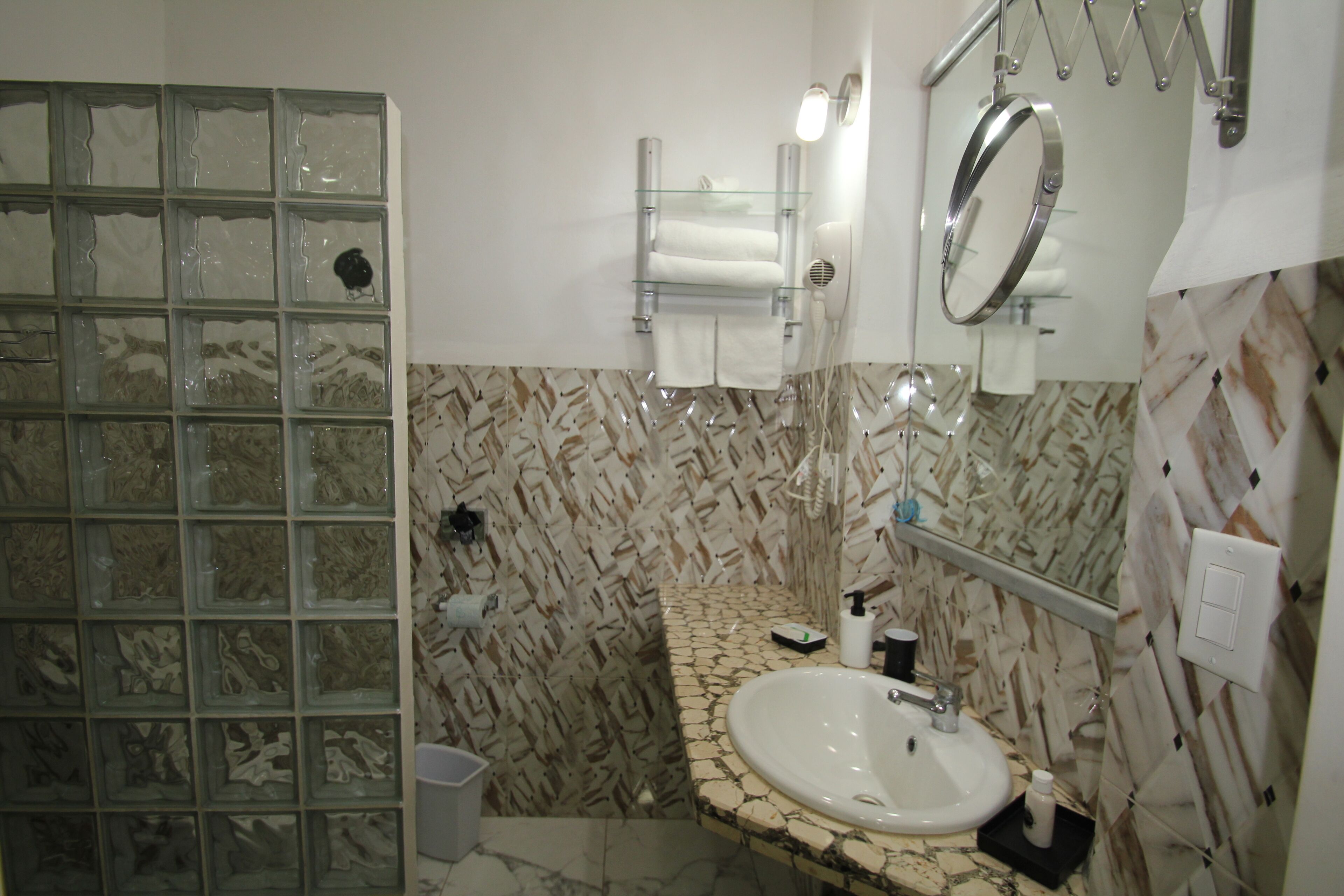 grand suite | bathroom | shower, free toiletries, hair dryer, towels