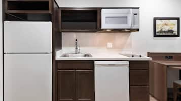 Full-sized fridge, microwave, stovetop, coffee/tea maker