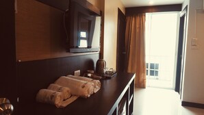 In-room safe, desk, laptop workspace, blackout drapes - BL Rabbit hotel (Patong)
