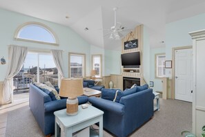 Flat-screen TV, fireplace, DVD player, foosball