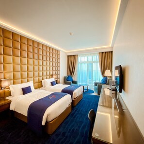 Deluxe Room, Balcony, Ocean View | Minibar, in-room safe, blackout curtains, iron/ironing board - Mirage Bab Al Bahr Hotel (Dhadnah)