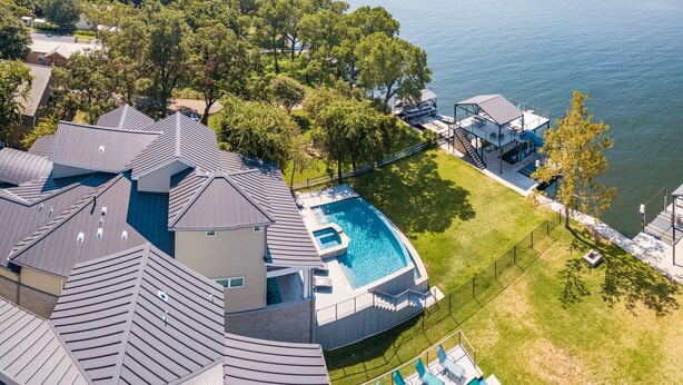 A residential property with a swimming pool, a dock, and a view of a lake. - Bud Lane Lakeside | Concierge Services (Kingsland)