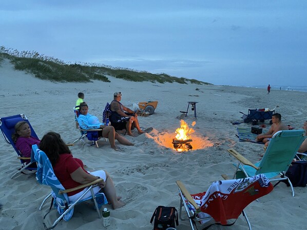 Guests can gather around the fire pit for a casual beach gathering.