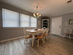 Enjoy meals in this dining area with a table and six comfortable chairs.