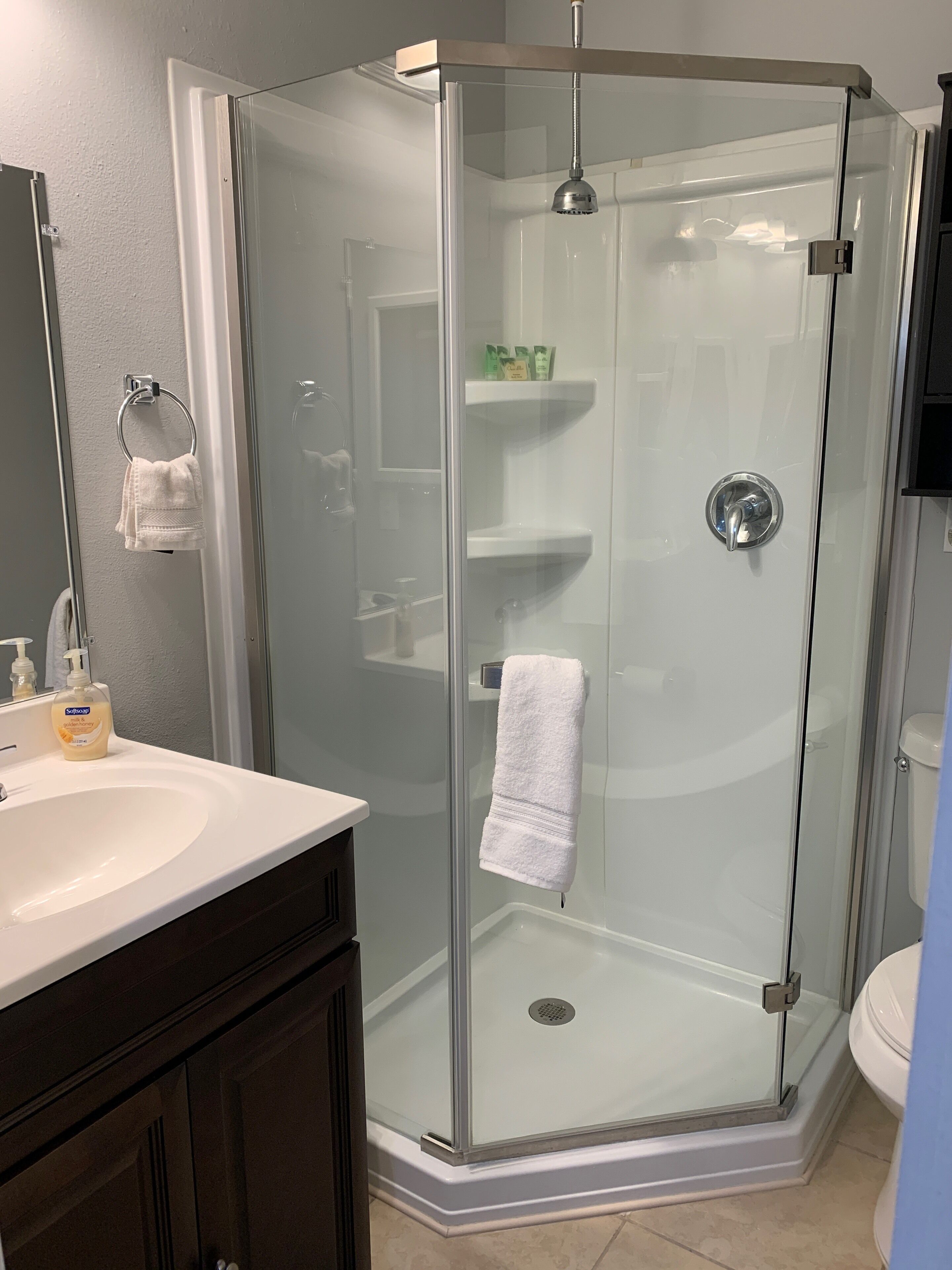 Shower, hair dryer, towels, soap