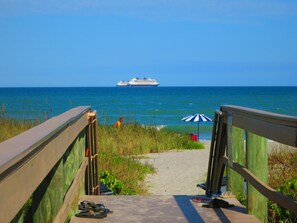 On the beach, sun-loungers