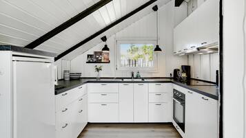 Fridge, stovetop, coffee/tea maker