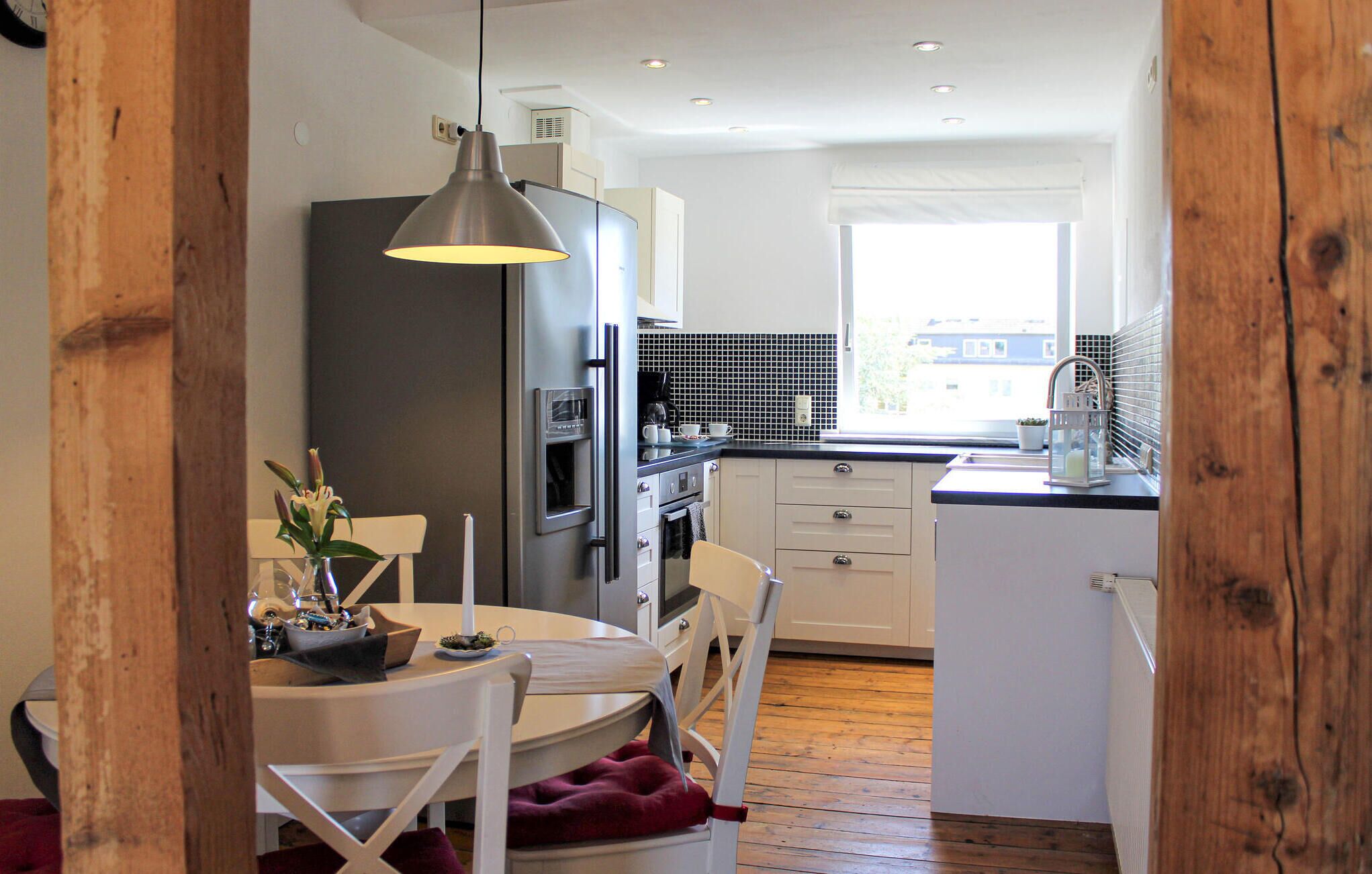 Fridge, stovetop, dishwasher, coffee/tea maker