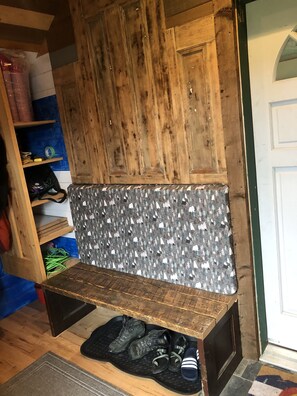 Cozy retreat with a bench and functional storage.