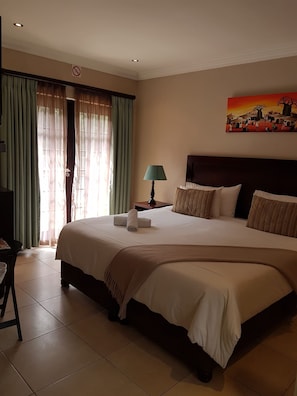 Habitación, 1 habitación, Terraza, vista al jardín | 1 habitación, wifi y ropa de cama 