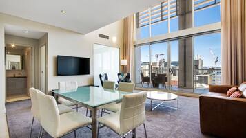 Premium Apartment, 2 Bedrooms, City View | Living area | TV