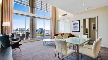 Premium Apartment, 2 Bedrooms, City View | Living area | TV