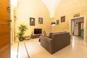 Appartamento, 1 camera da letto, fumatori, patio | Area soggiorno