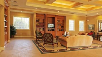 Condo, 4 Bedrooms, Balcony, Garden View | Living area | Books