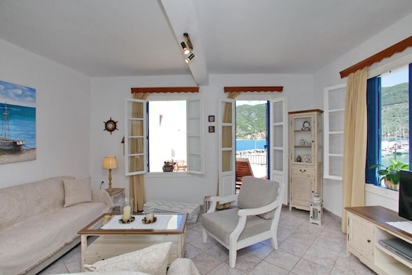 Villa, 2 Bedrooms, Smoking, Balcony | Living area | Flat-screen TV, books - Villa Yiannoula With Amazing sea View at Skopelos Old Port !!! (Skopelos)