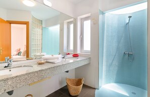 Bathtub, hair dryer, towels