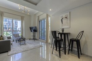 Basic Apartment, 1 Double Bed | Living room | TV - Guestready - Bay Central Tower, Dubai Marina (Dubai)
