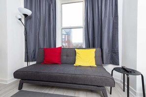 Lägenhet Basic - 1 dubbelsäng med bäddsoffa | Vardagsrum | Tv