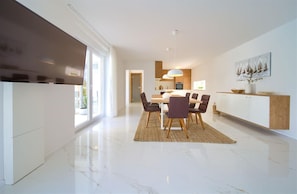 Enjoy cooking in this well-lit kitchen with a central island and ample counter space.