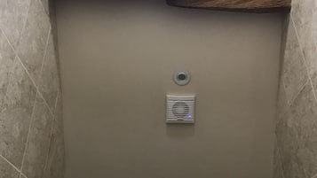 Shower, hair dryer, towels