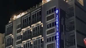 A multi-story hotel with a prominent "JEWEL HOTEL" sign. - Jewel Port Said Hotel (Port Said)