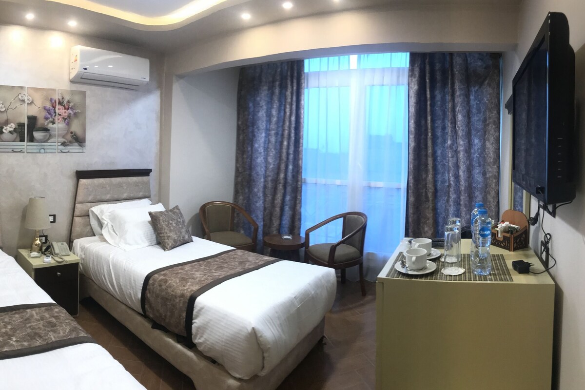 Egyptian cotton sheets, premium bedding, minibar, in-room safe