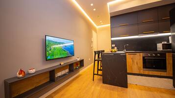 Apartment, 1 Bedroom, Balcony (1) | Private kitchen | Full-size fridge, microwave, oven, stovetop