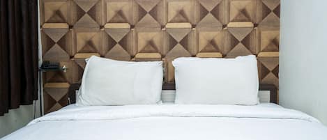 Deluxe kamer | Een bureau, een strijkplank/strijkijzer, gratis wifi, beddengoed