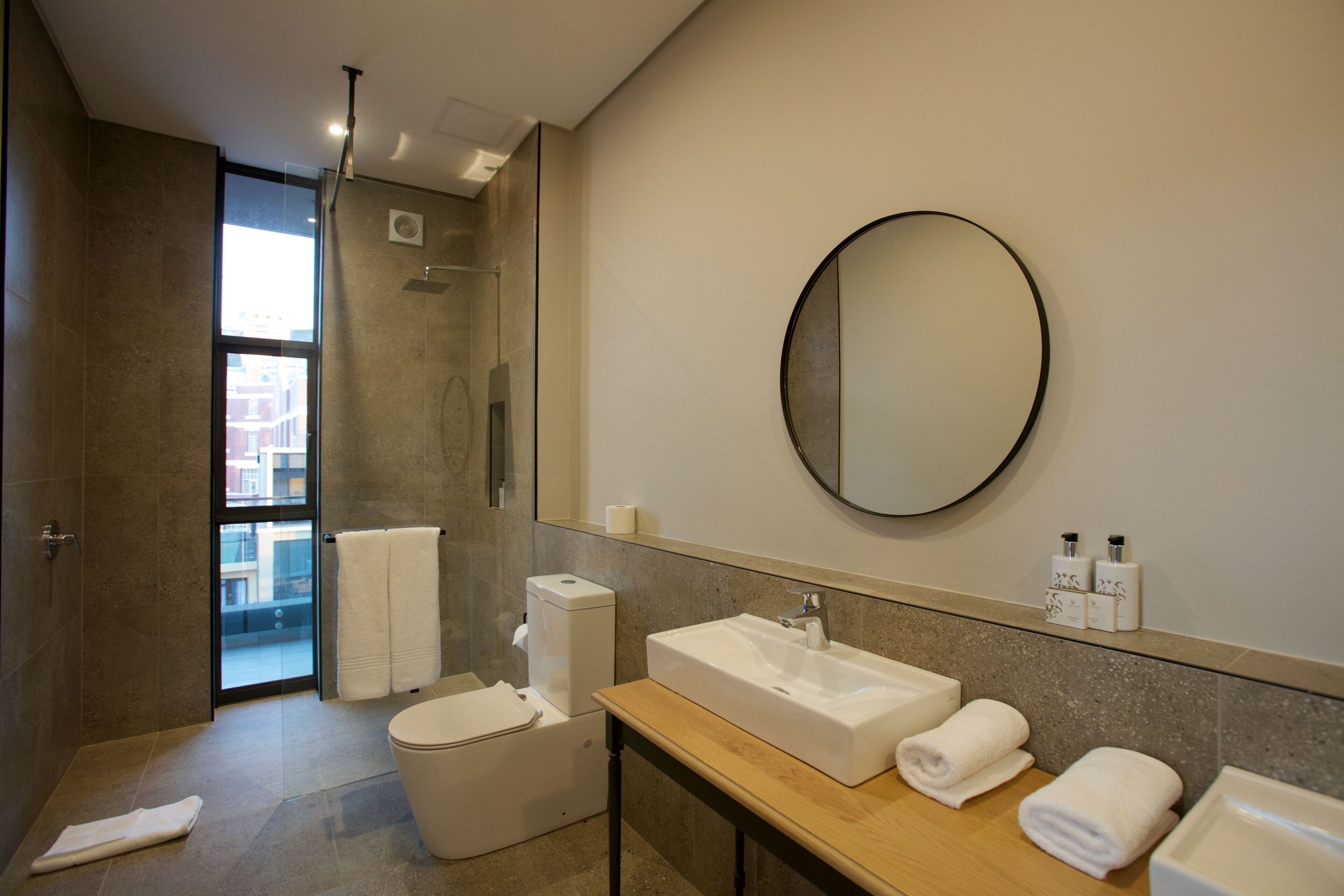 luxury penthouse | bathroom | designer toiletries, towels, soap, shampoo