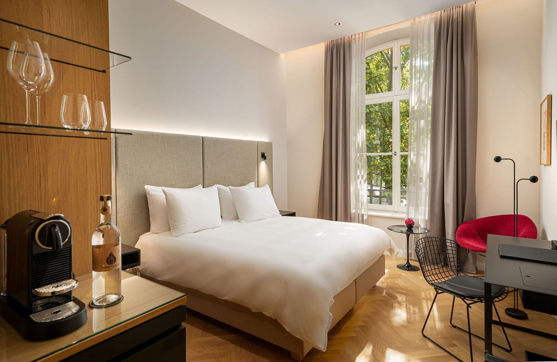 Premium bedding, down comforters, pillowtop beds, minibar