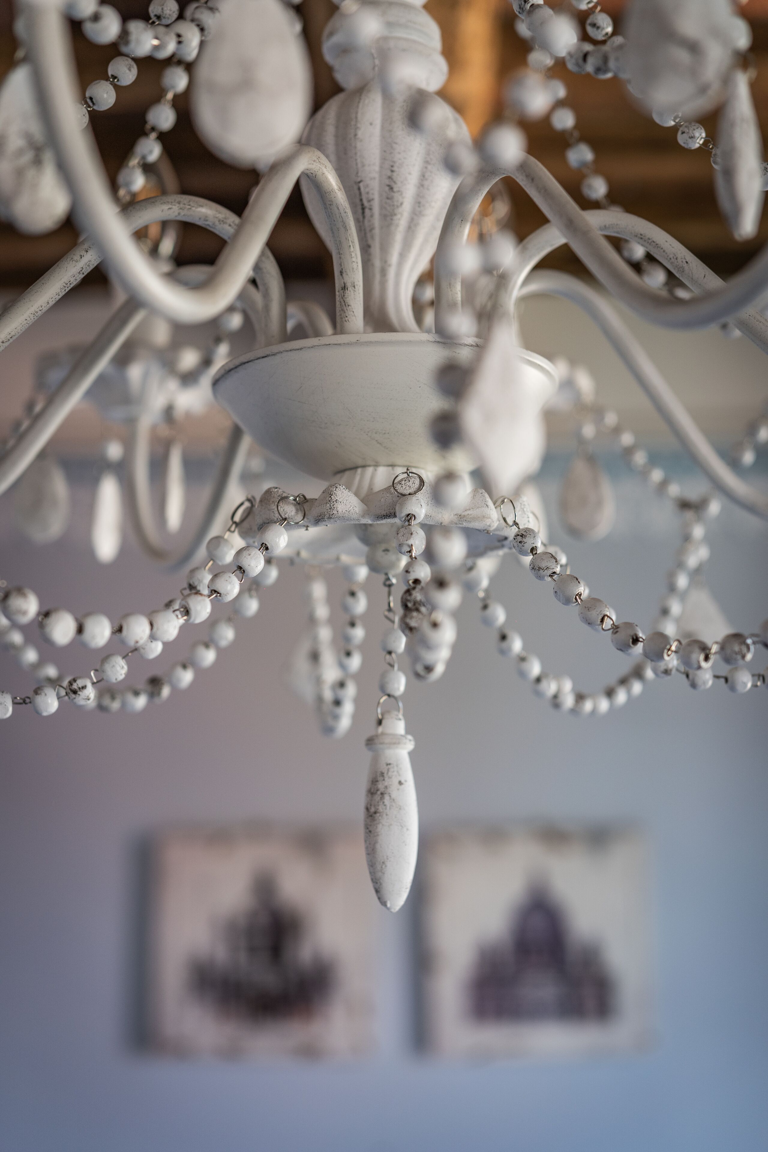 A chandelier with multiple chains and spherical elements.