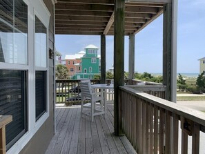 Outdoor dining - Oceanside Triplex Condo, steps from the sand w/ stunning ocean views! (Atlantic Beach)