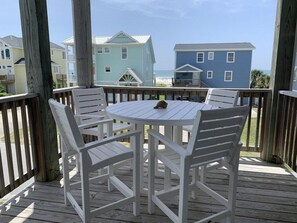 Outdoor dining - Oceanside Triplex Condo, steps from the sand w/ stunning ocean views! (Atlantic Beach)