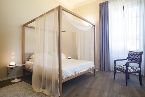 Frette Italian sheets, premium bedding, down duvets, minibar