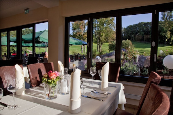 Breakfast served, local and international cuisine, golf course views